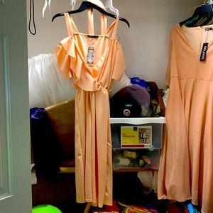 Size 10 pink/peach dress right below knees. Off shoulder sleeves